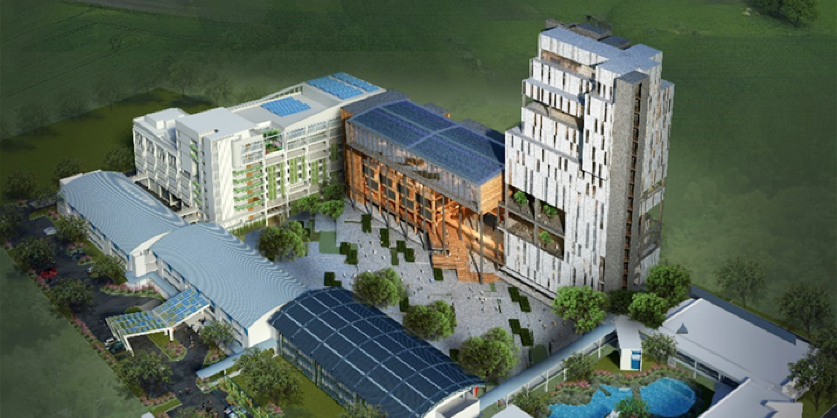 Aerial view of BCA Academy campus with interconnected buildings, solar panels, and landscaped courtyards.